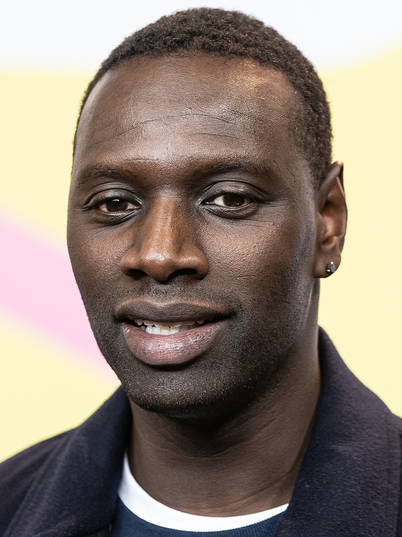 Omar Sy: Zwischen Licht und Schatten – Ein Blick hinter den Vorhang