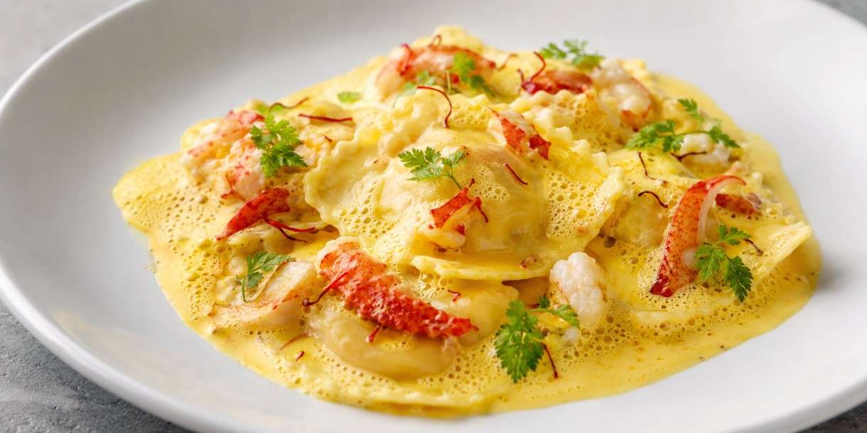 Ravioles de Homard mit Safranschaum